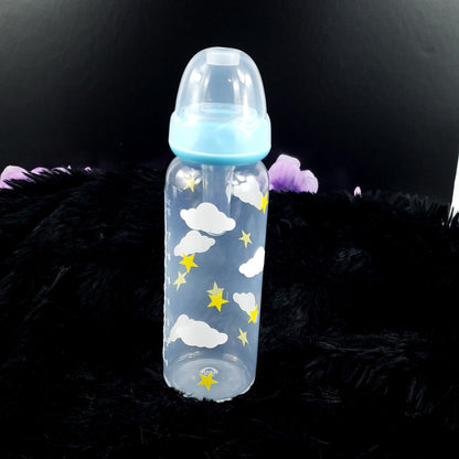 An 8oz adult baby bottle featuring a charming design with yellow stars and white clouds, creating a whimsical and cheerful night-inspired theme.