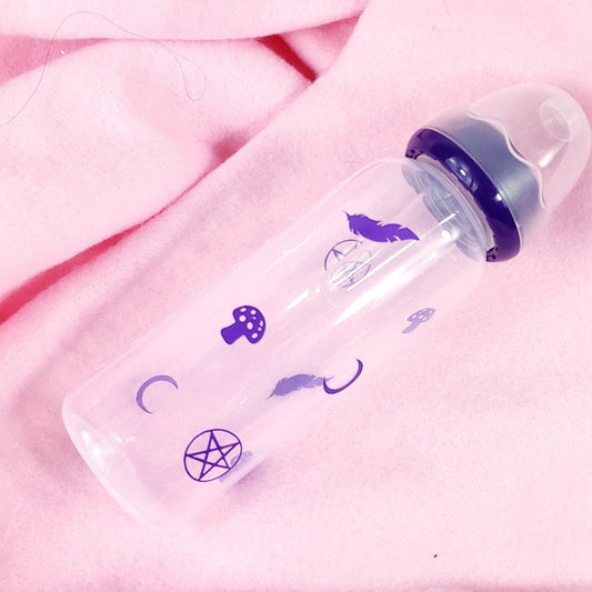 An 8oz adult baby bottle with a purple witch theme, featuring magical designs like feathers, mushroom, pentagrams, and moons wrapping around the bottle for a whimsical and enchanting look.