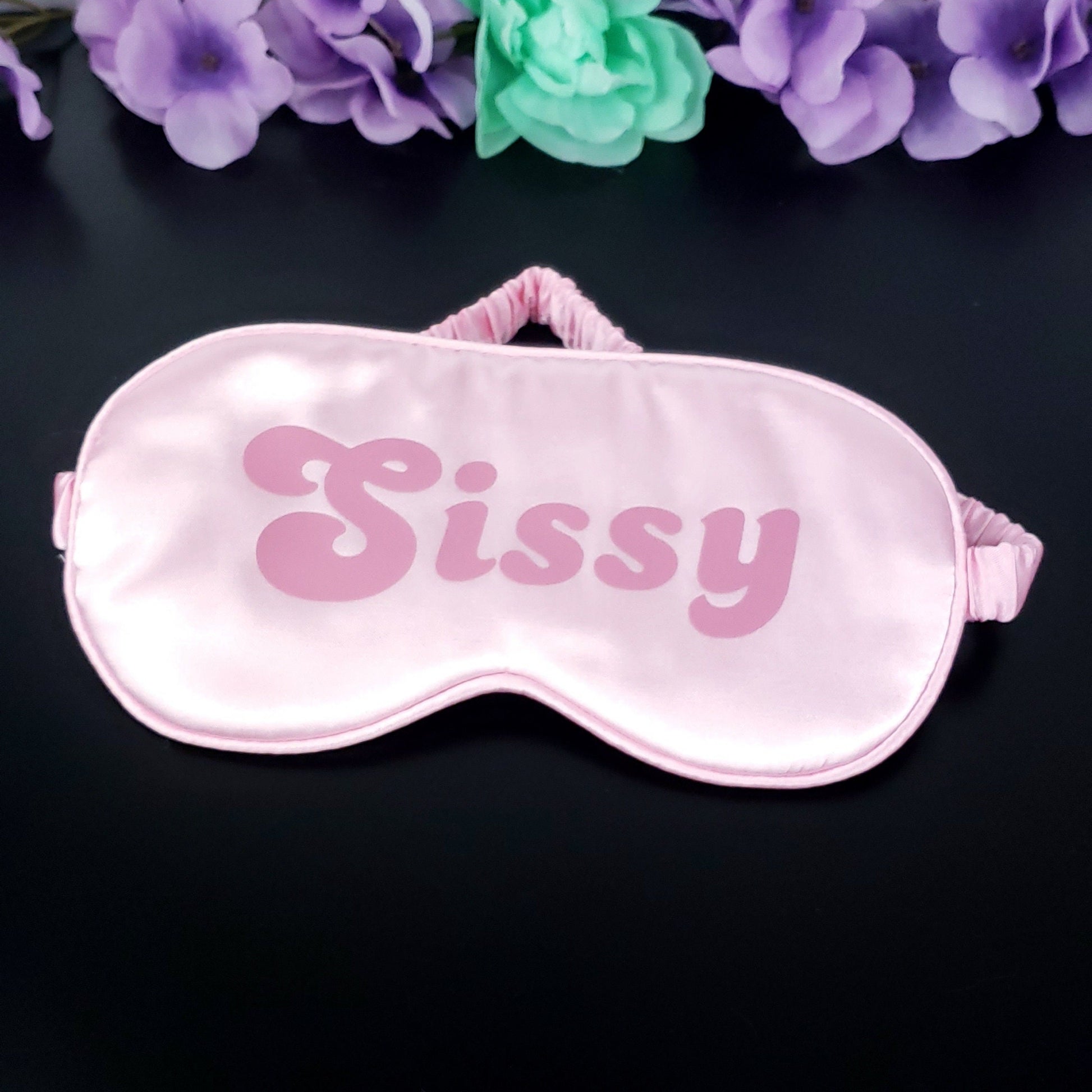 BDSM adult blindfold with the text Sissy on it