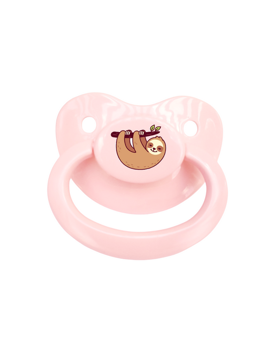 A pink adult pacifier with a cute sloth graphic design.