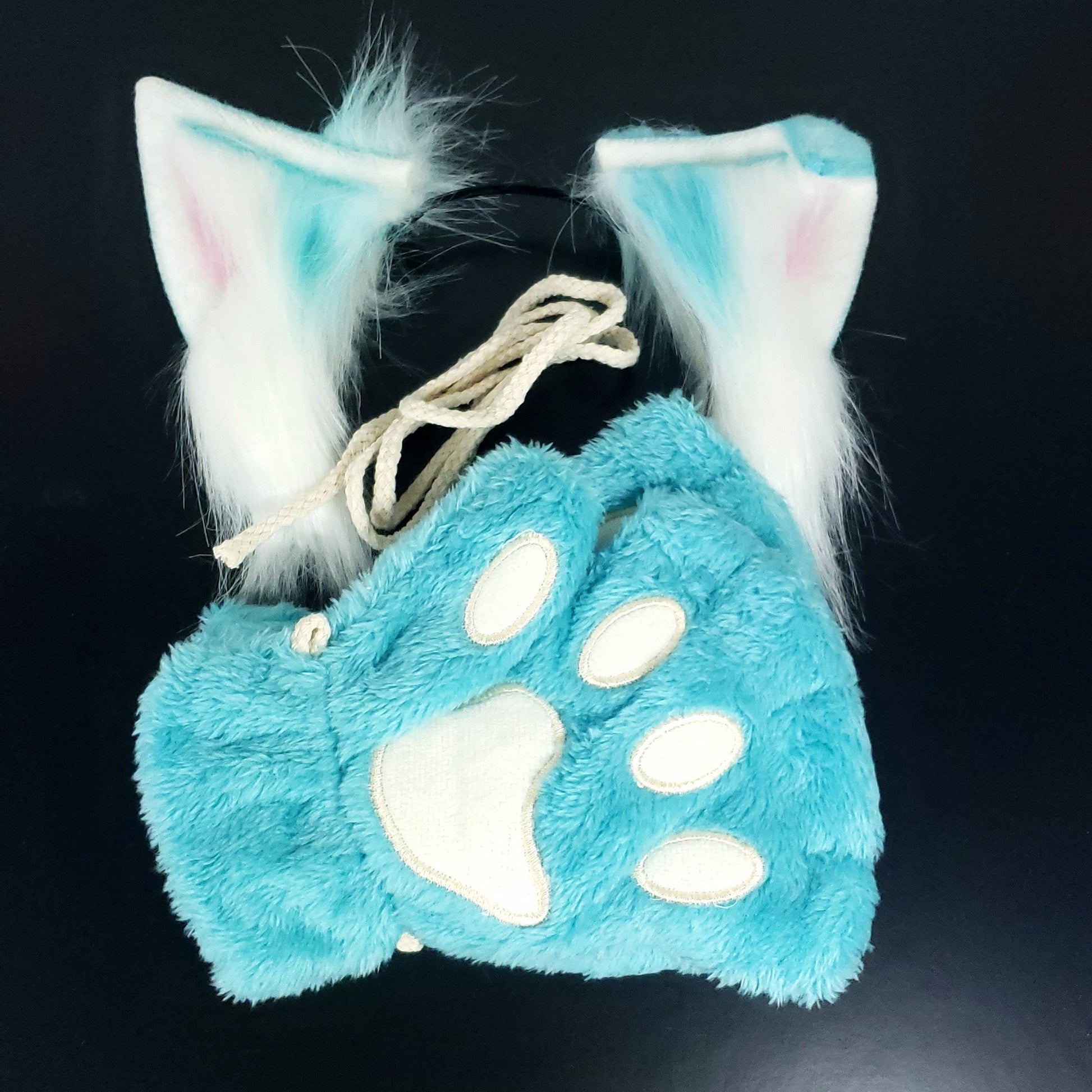 Cosplay ears and paws set in teal, featuring soft, fluffy animal ears and matching paw gloves, perfect for pet play or cute cosplay looks.