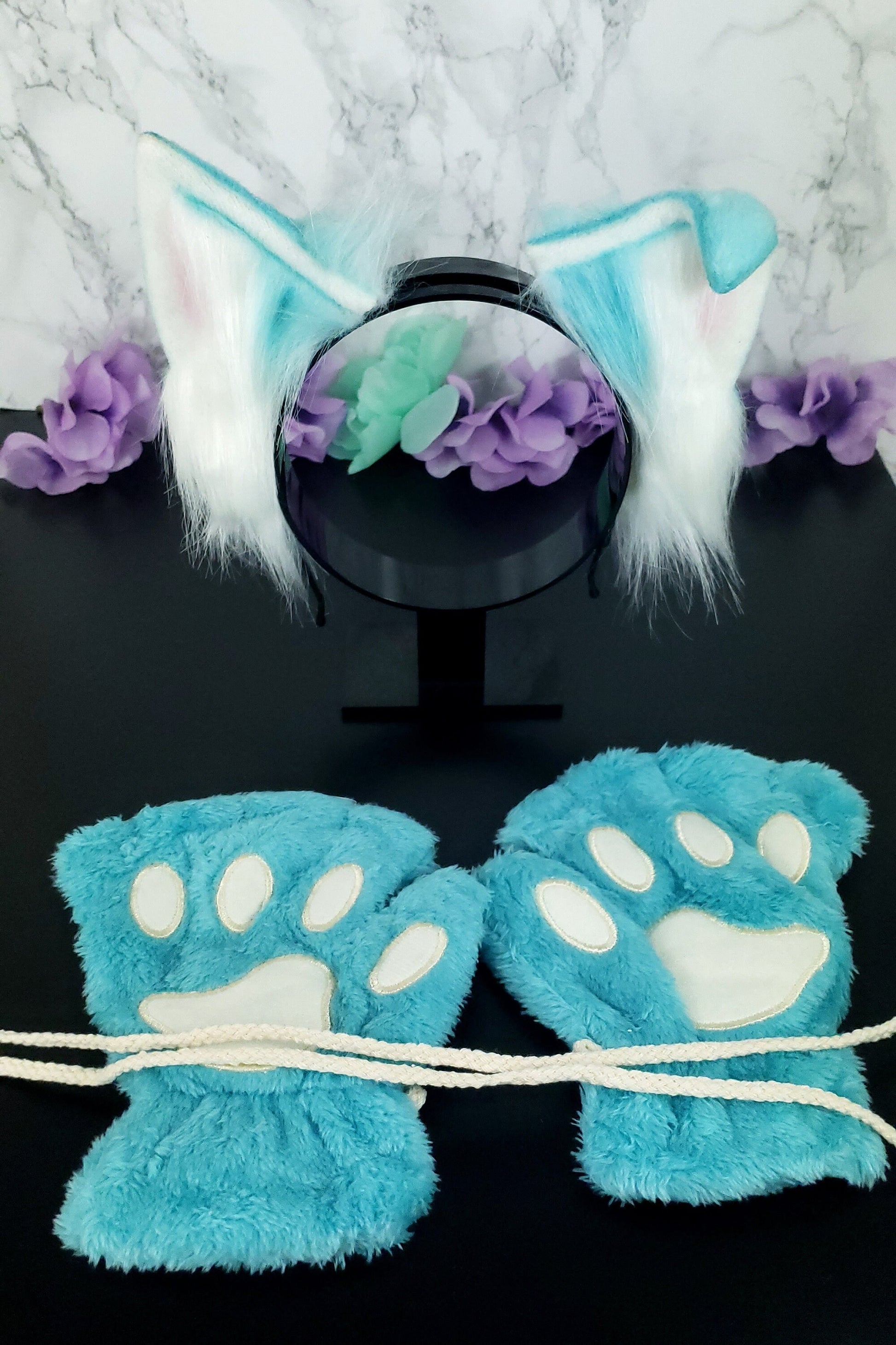 Cosplay ears and paws set in teal, featuring soft, fluffy animal ears and matching paw gloves, perfect for pet play or cute cosplay looks.