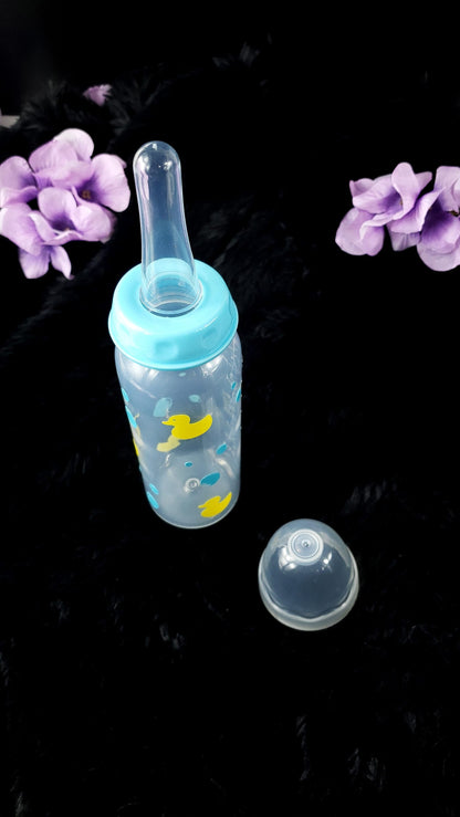 An 8oz adult baby bottle featuring a playful design with yellow ducks and blue bubbles, creating a fun and whimsical bath-time-inspired theme.