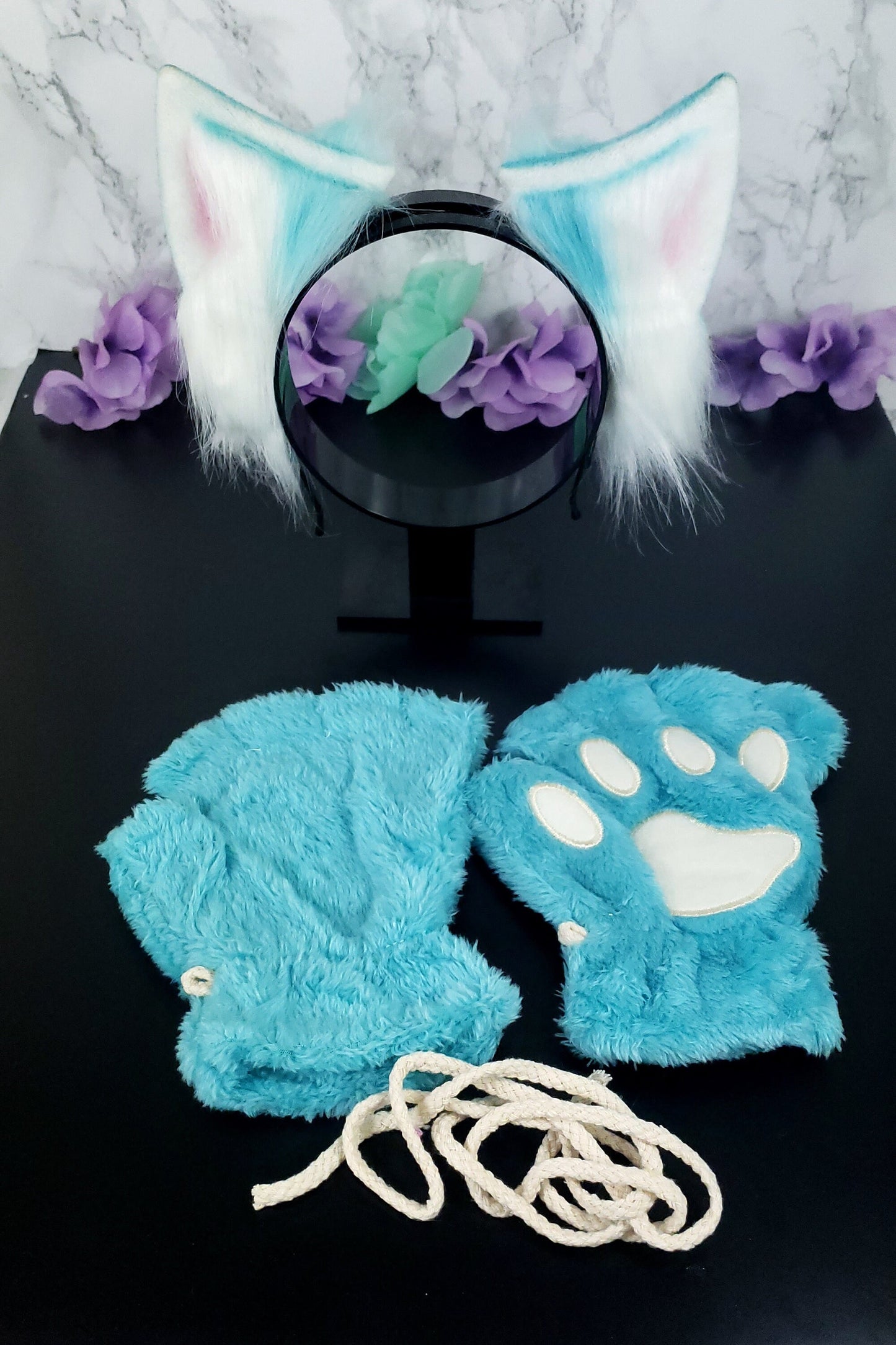 Cosplay ears and paws set in teal, featuring soft, fluffy animal ears and matching paw gloves, perfect for pet play or cute cosplay looks.