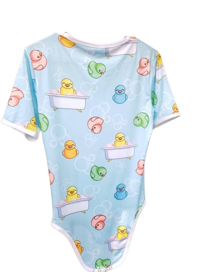 A blue adult baby onesie featuring a playful design with rubber ducks and bubbles, creating a cheerful and bath-time-inspired theme.